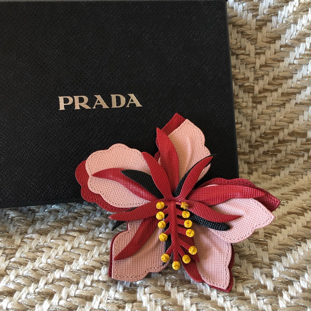 Prada brooch